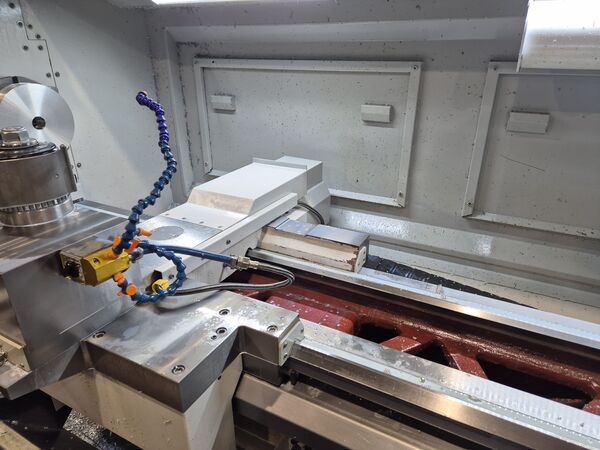 Turning a metal part on a CNC lathe — MIKRO-PRO workshop, Ruše.